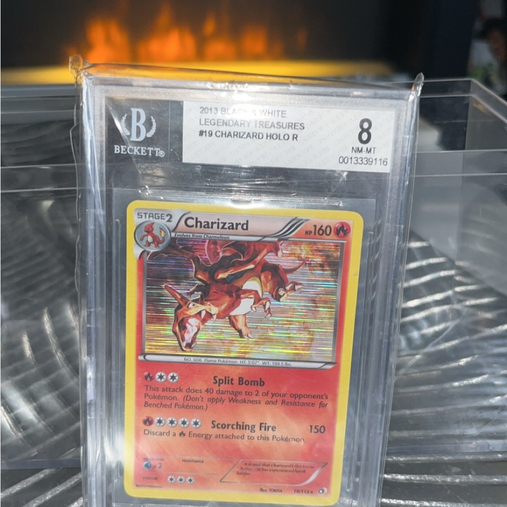 Beckett Graded Charizard Holo Pokémon Card - BECKETT MINT 8